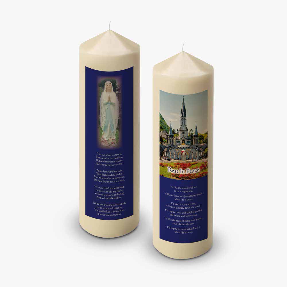 two candles with a picture of the city of london on them