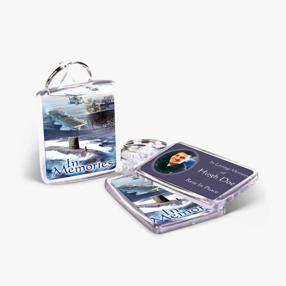 a key chain with a picture of a ship on it