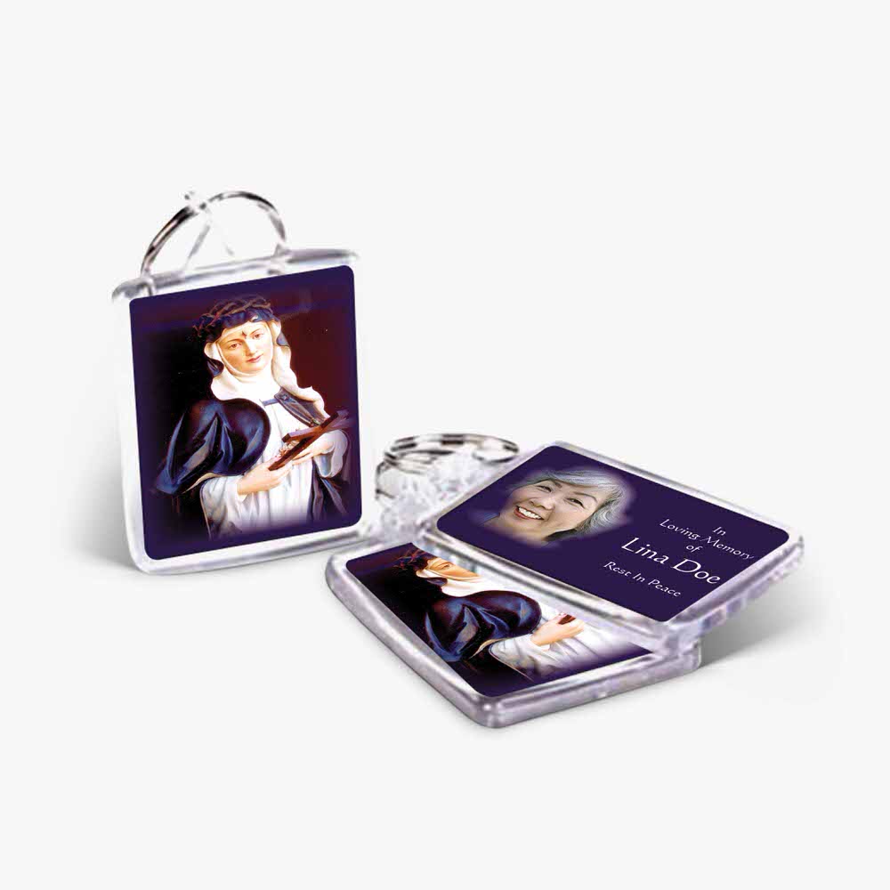 a key chain with a photo of a woman in a purple dress