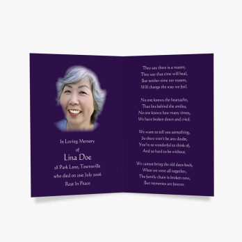 a purple funeral card with a photo of an older woman