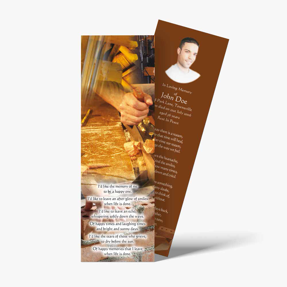 a bookmark with a picture of a man working on a car