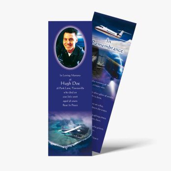 a bookmark with a photo of a man on a plane