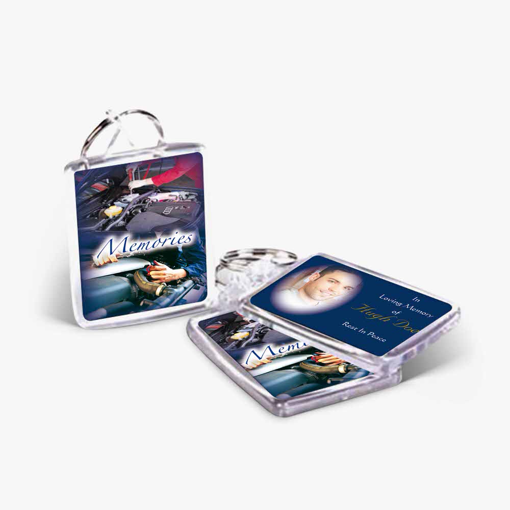 a photo keychain with a picture of a plane and a picture of a person