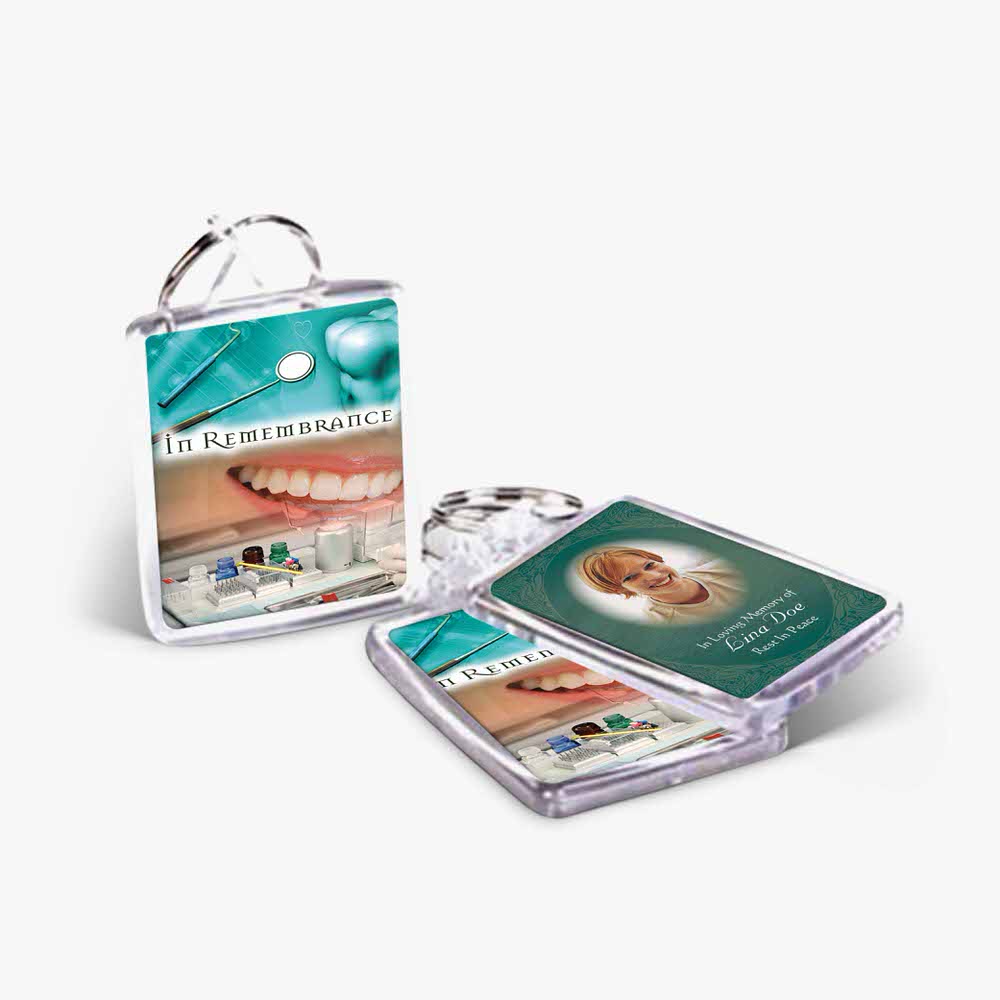 the dental keyring is a small plastic case with a picture of a toothbrush