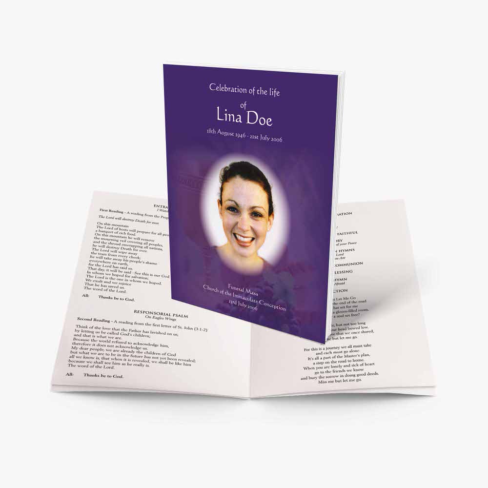 a purple book with a photo of a smiling woman on the front