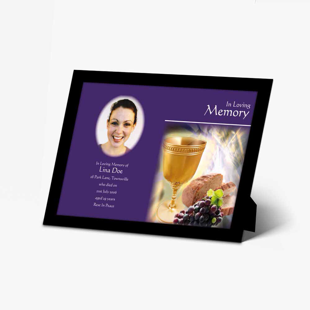 a memorial card with a picture of a woman and wine