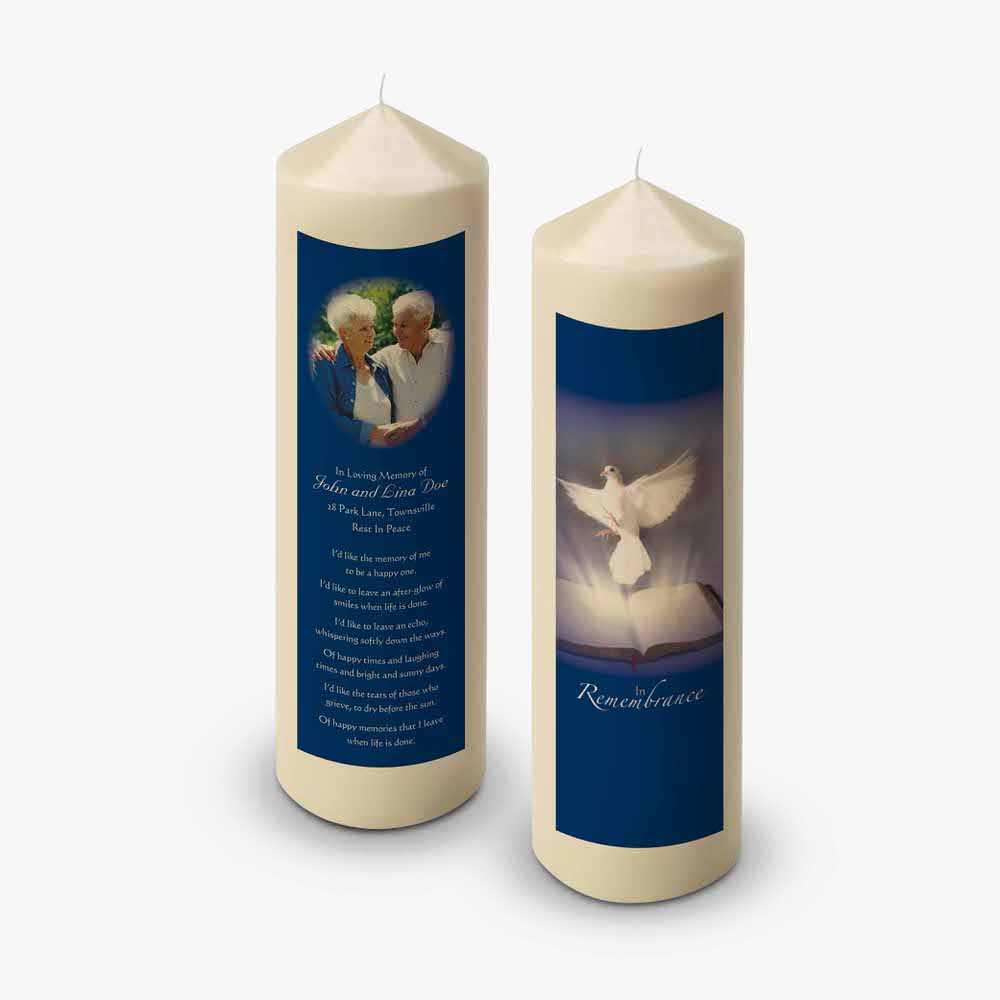 a candle with a photo of a dove and a quote