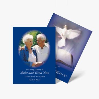 a blue and white photo card with a dove and a bible