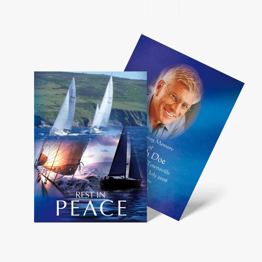 a blue and white card with a photo of a sailboat