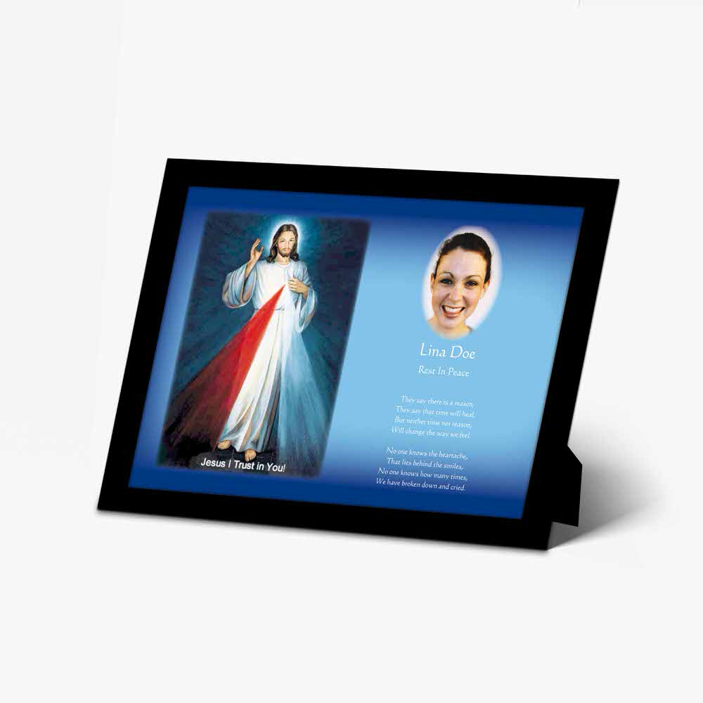 a framed photo of the jesus and the holy mother