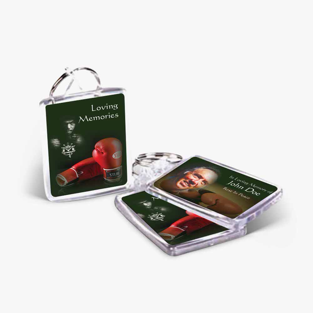 a keychain with a picture of a boxer and a keyring