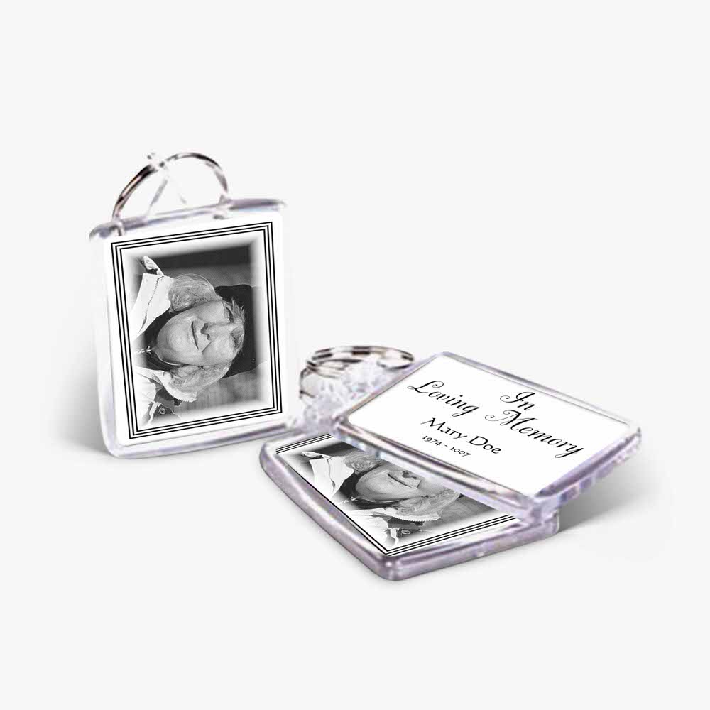 a photo frame with a key chain attached to it