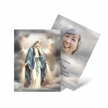 a card with a picture of the virgin mary