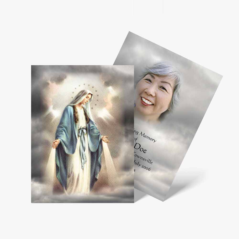 a card with a picture of the virgin mary