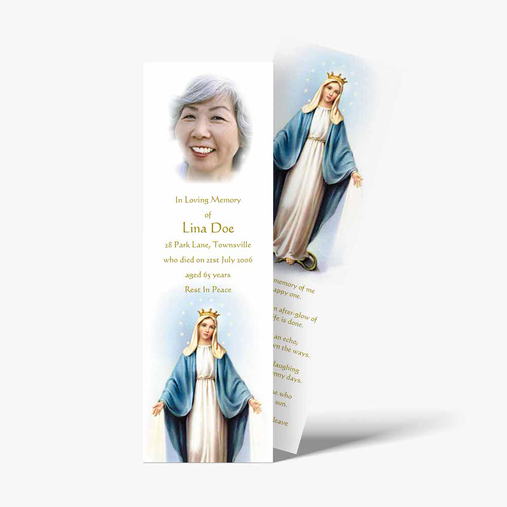 a bookmark with a picture of the virgin mary