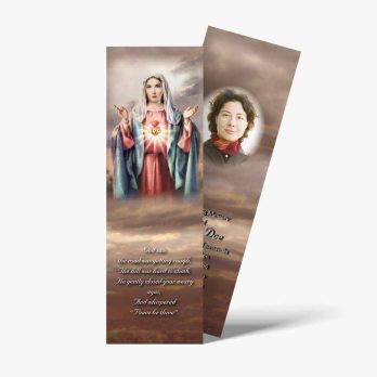 a bookmark with a picture of the virgin mary