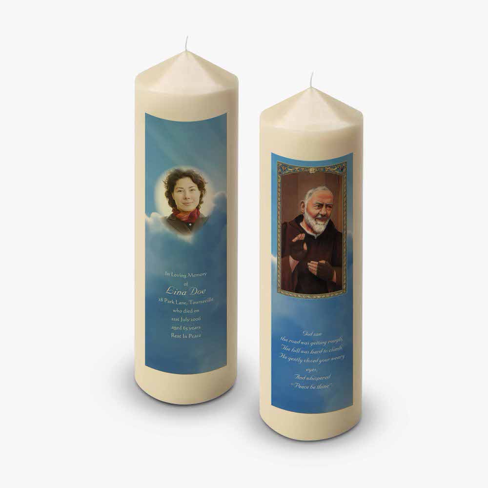 two candles with a picture of a man and woman on them