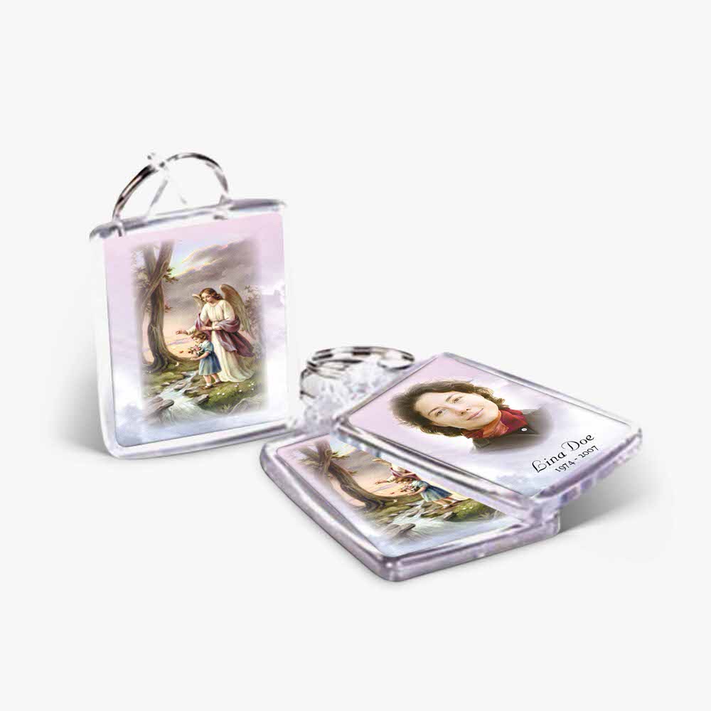 a key chain with a picture of a woman and a man
