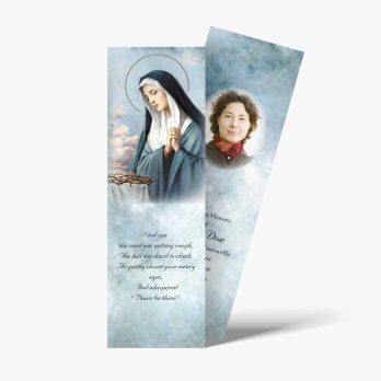 a bookmark with a picture of mary and a quote