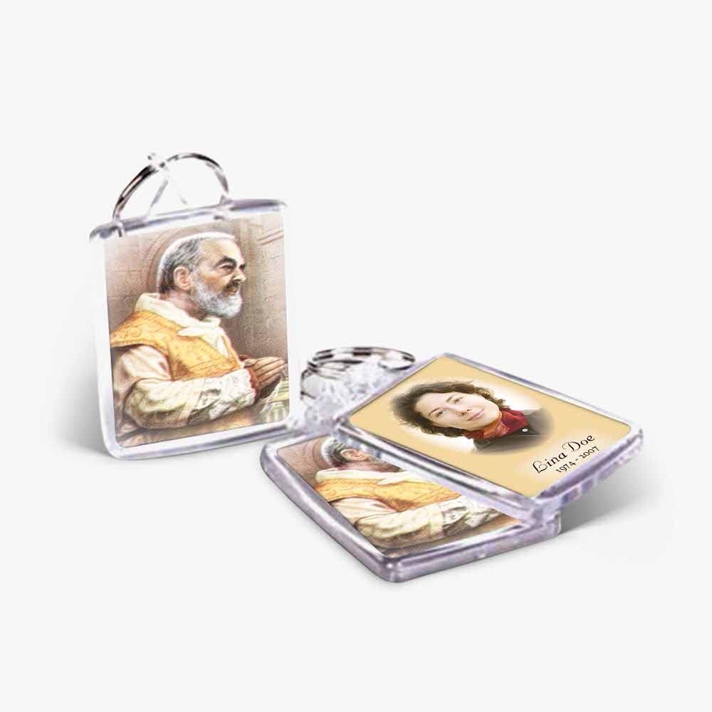 a keychain with a picture of a man and woman