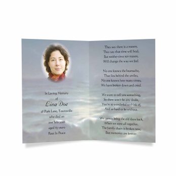 a funeral card with a photo of a woman in the ocean