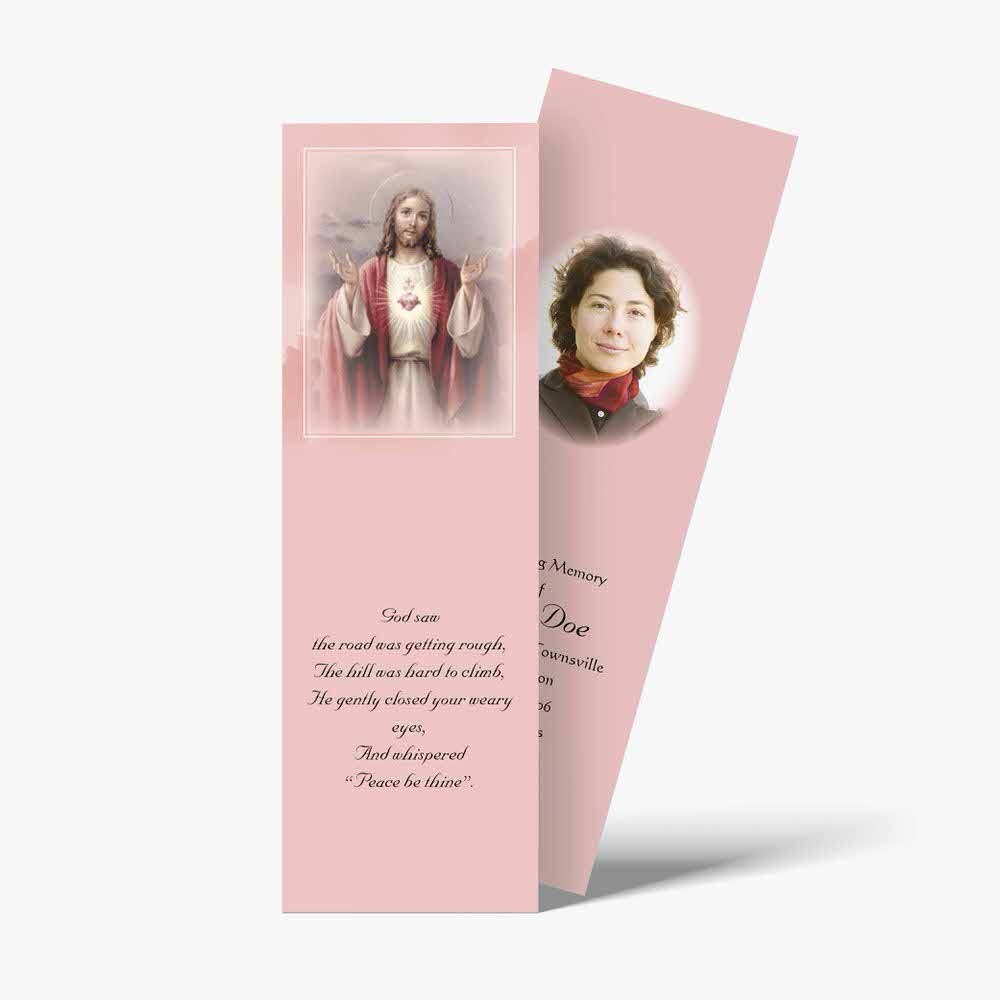a pink bookmark with a picture of jesus