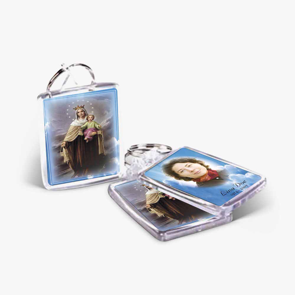a key chain with a picture of mary and a picture of her in it