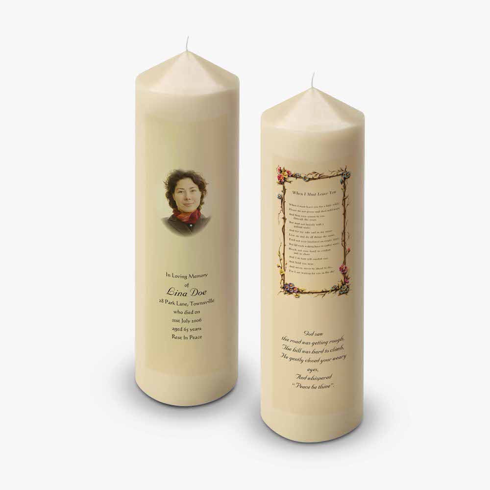 two candles with a picture of a woman on them