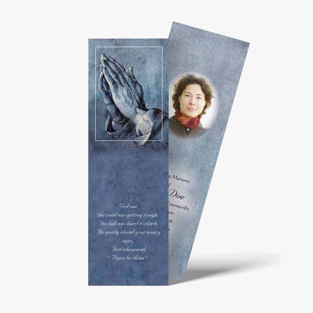 a bookmark with a photo of a woman praying
