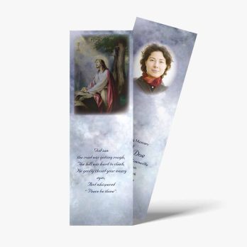 a bookmark with a picture of jesus and a woman