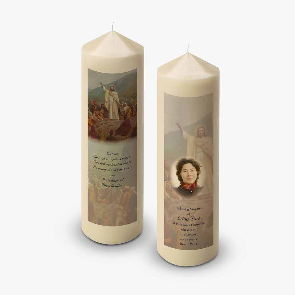 two candles with a picture of a woman on them