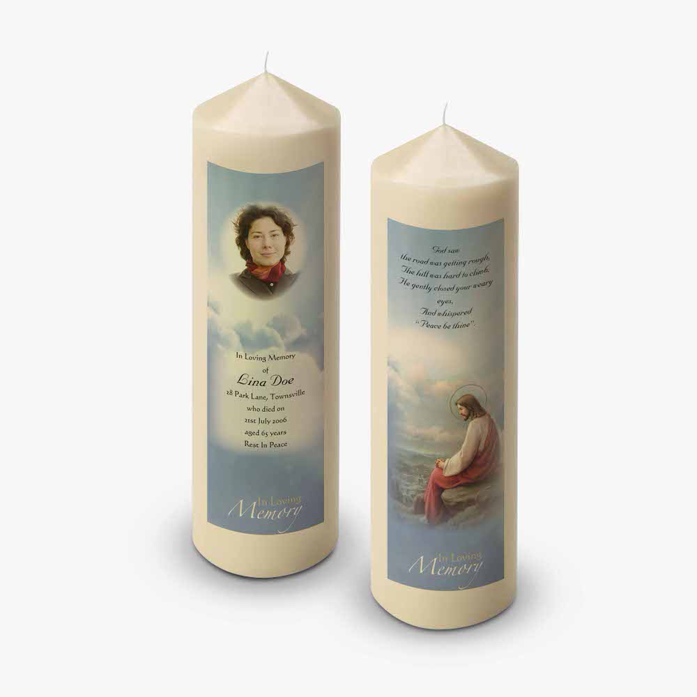 two candles with a picture of a woman on them