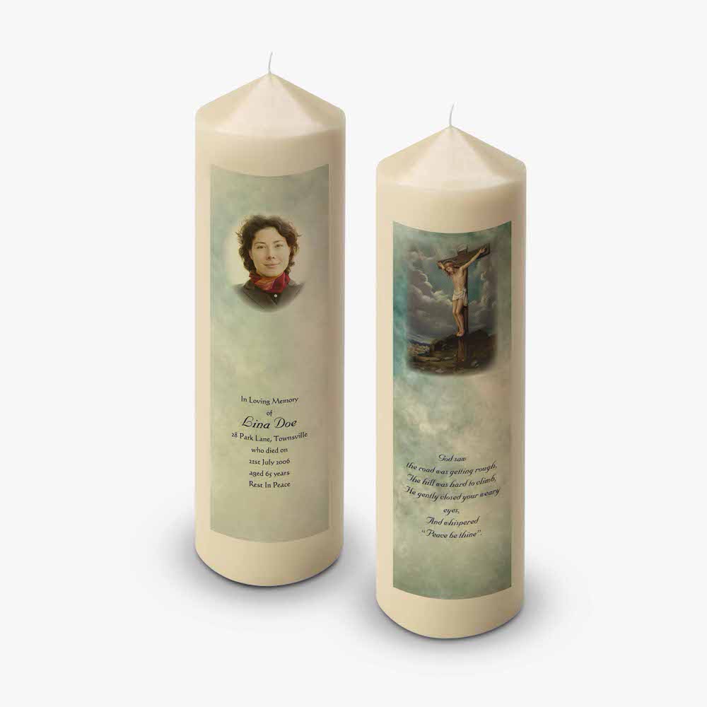 two candles with a picture of a woman on them