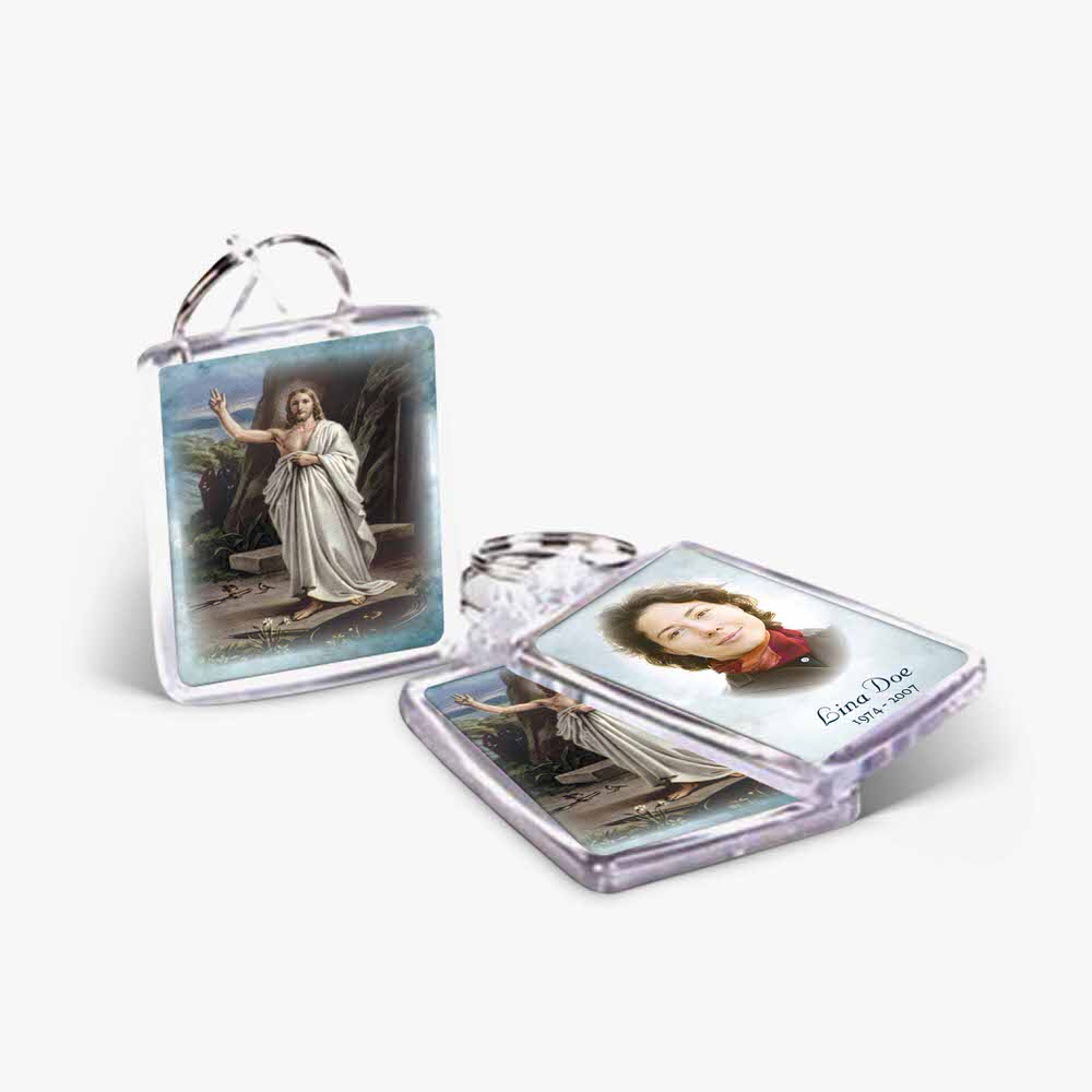 a keychain with a picture of a woman and a picture of a child