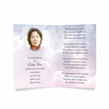 a funeral card with a photo of a woman in a pink and white sky