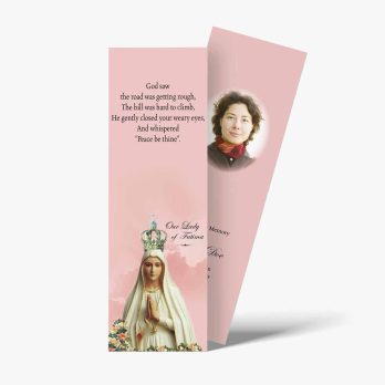 a bookmark with a picture of the virgin mary