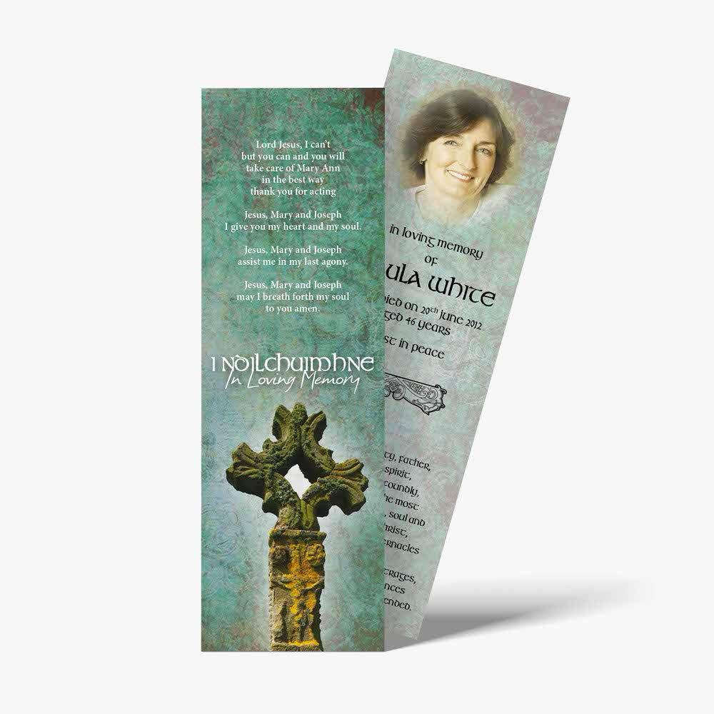 a bookmark with a cross on it and a picture of a person
