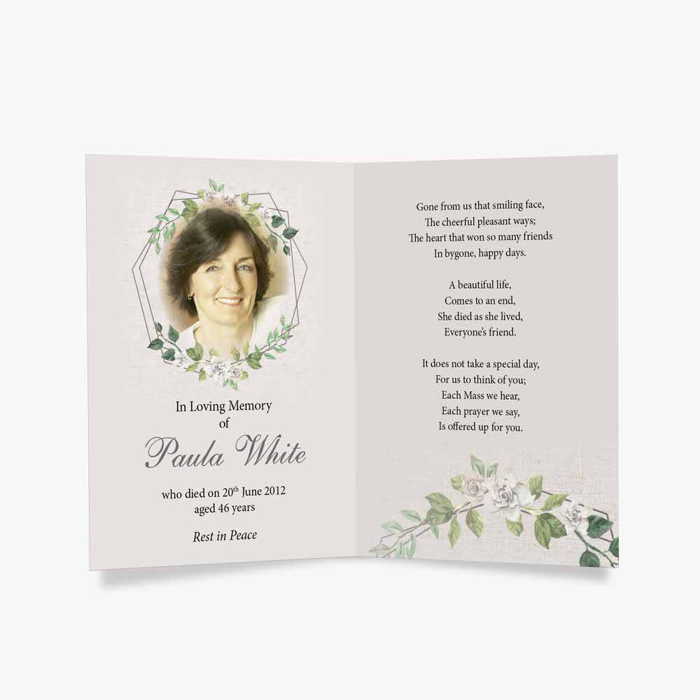 a funeral card with a floral design and a photo of a woman in a green dress