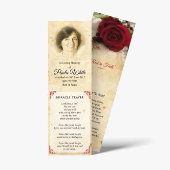 a funeral bookmark with a rose on it